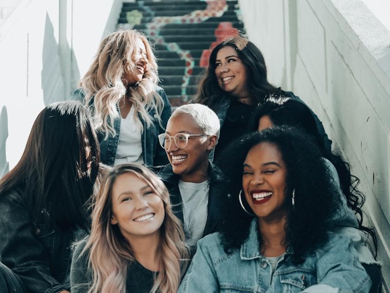 A circle of women laughing together