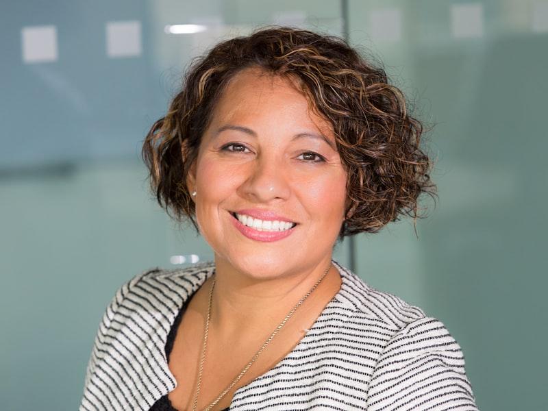 A Femmeville member smiling